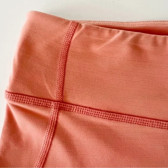 Outdoor Voices Tech Sweat Biker Shorts in Heathered Orange Peach - Picture 6 of 16